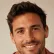 Portrait of a smiling man with short dark hair