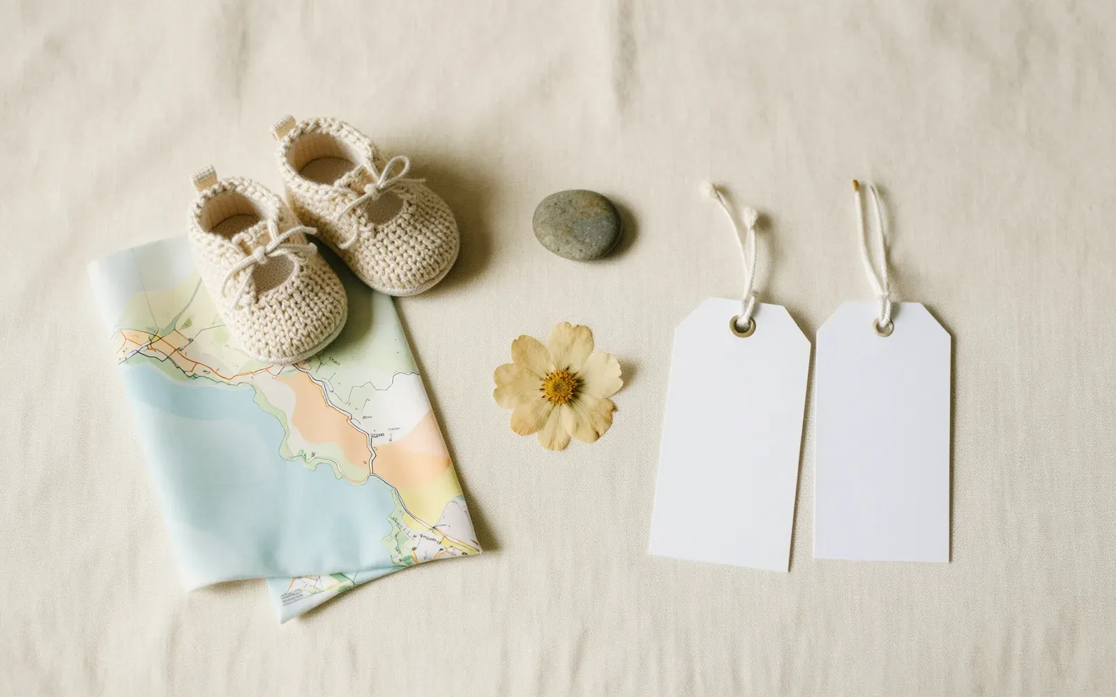 DearBaby Baby Passport showing a coastline map and keepsakes from family trips